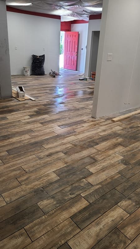 Wood-look plank tile floor in an open room